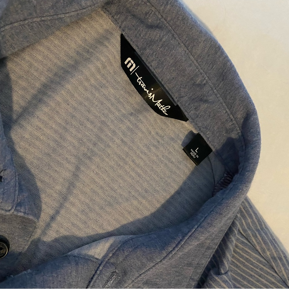 Travis Mathew golf polo. Men’s size L.